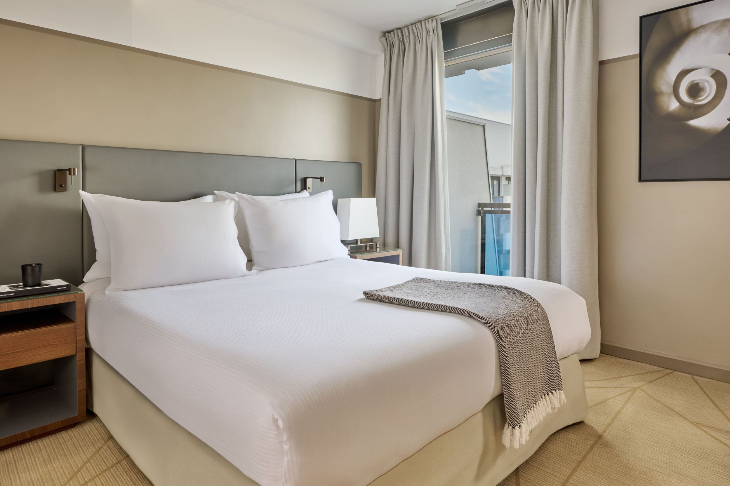 Bedroom at Fraser Suites Harmonie - serviced hotel and long term rental apartments in La Défense Paris
